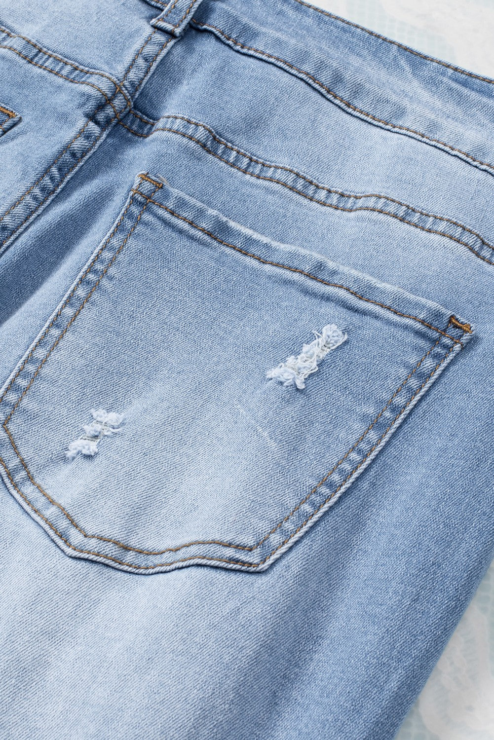 Sky Blue Buttoned Pockets Distressed Jeans