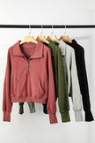 Green Zip Up Stand Collar Ribbed Thumbhole Sleeve Sweatshirt